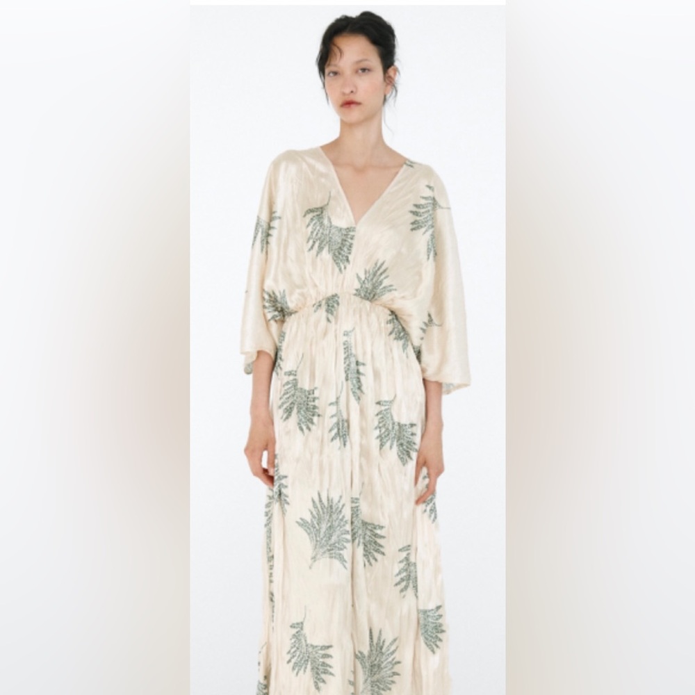 Zara Mid Tunic Dress with V neck and elbow-length sleeves.